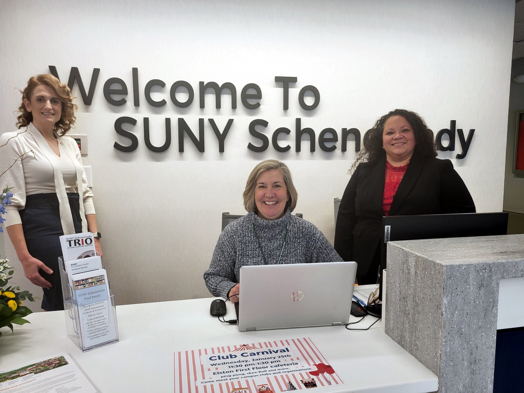 Staff at the Welcome Desk, Elston Hall Lobby