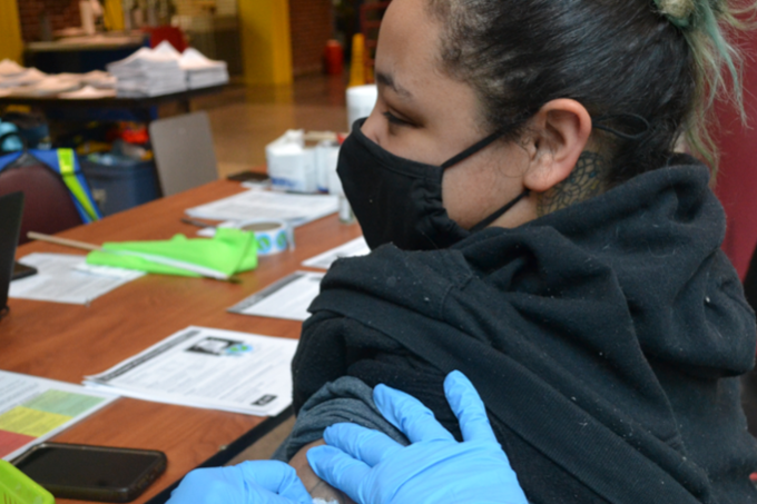 Student getting vaccinated