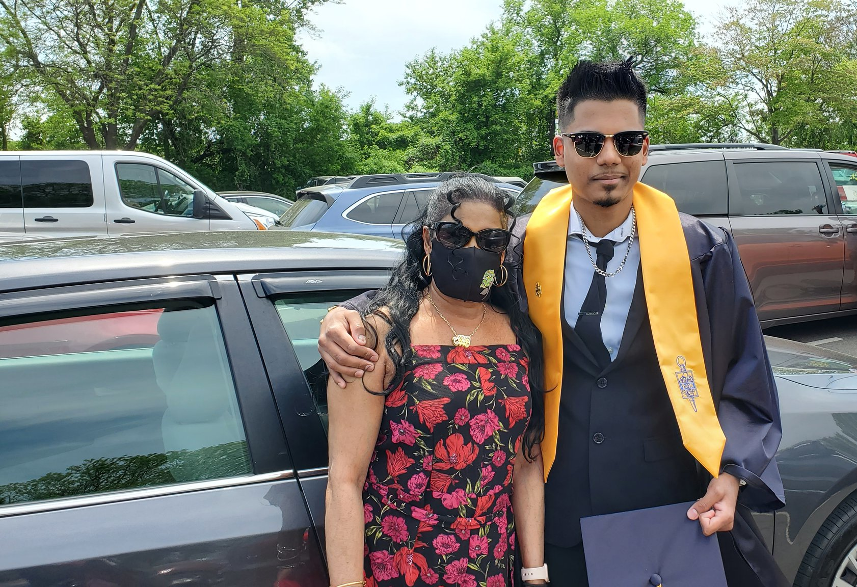 Graduate and his proud mother