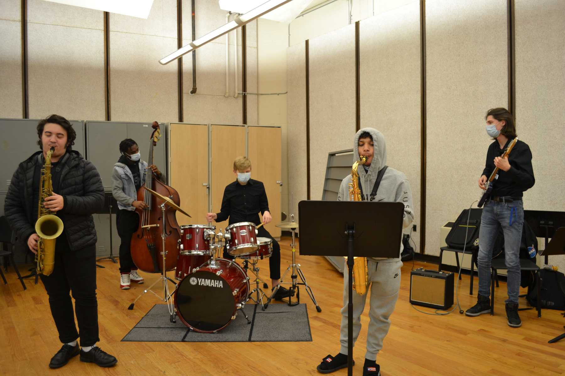 Jazz musicians rehearsing in music room