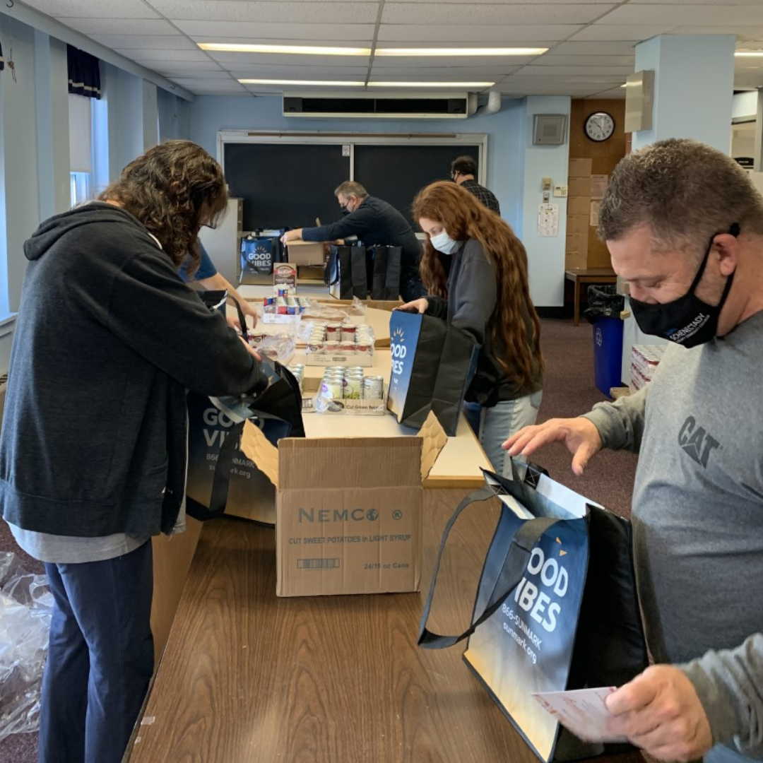 Staff assembling meal kits