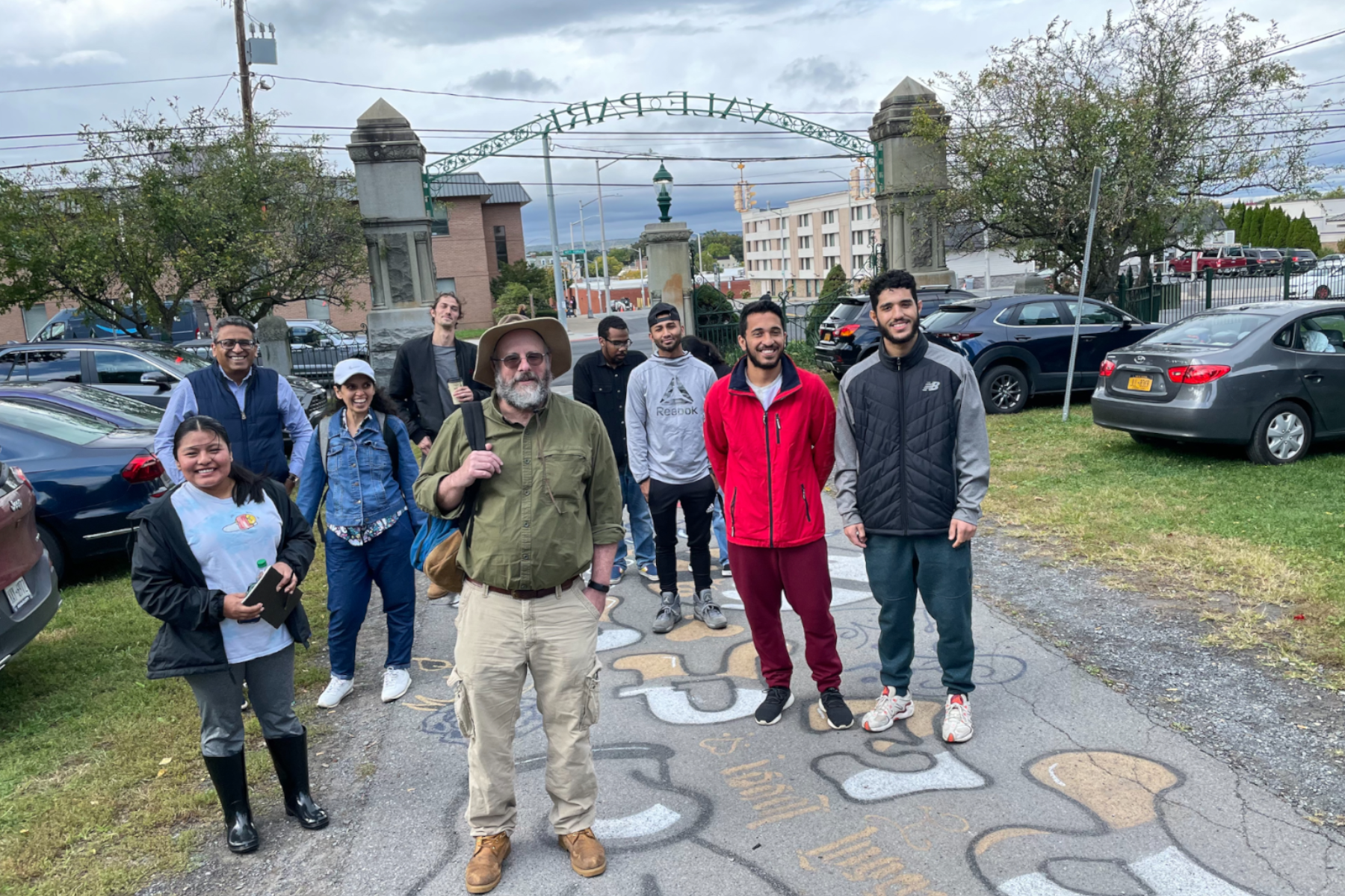 Science students and faculty standing in front of Vale Park