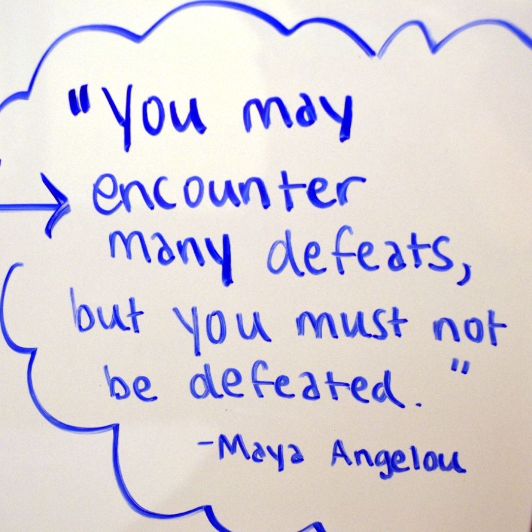Quote from Maya Angelou about not being defeated.