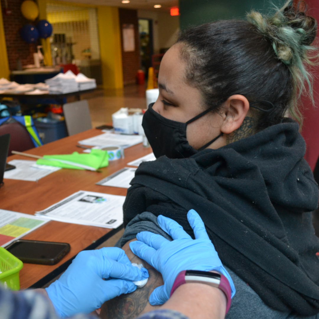 Student getting vaccinated