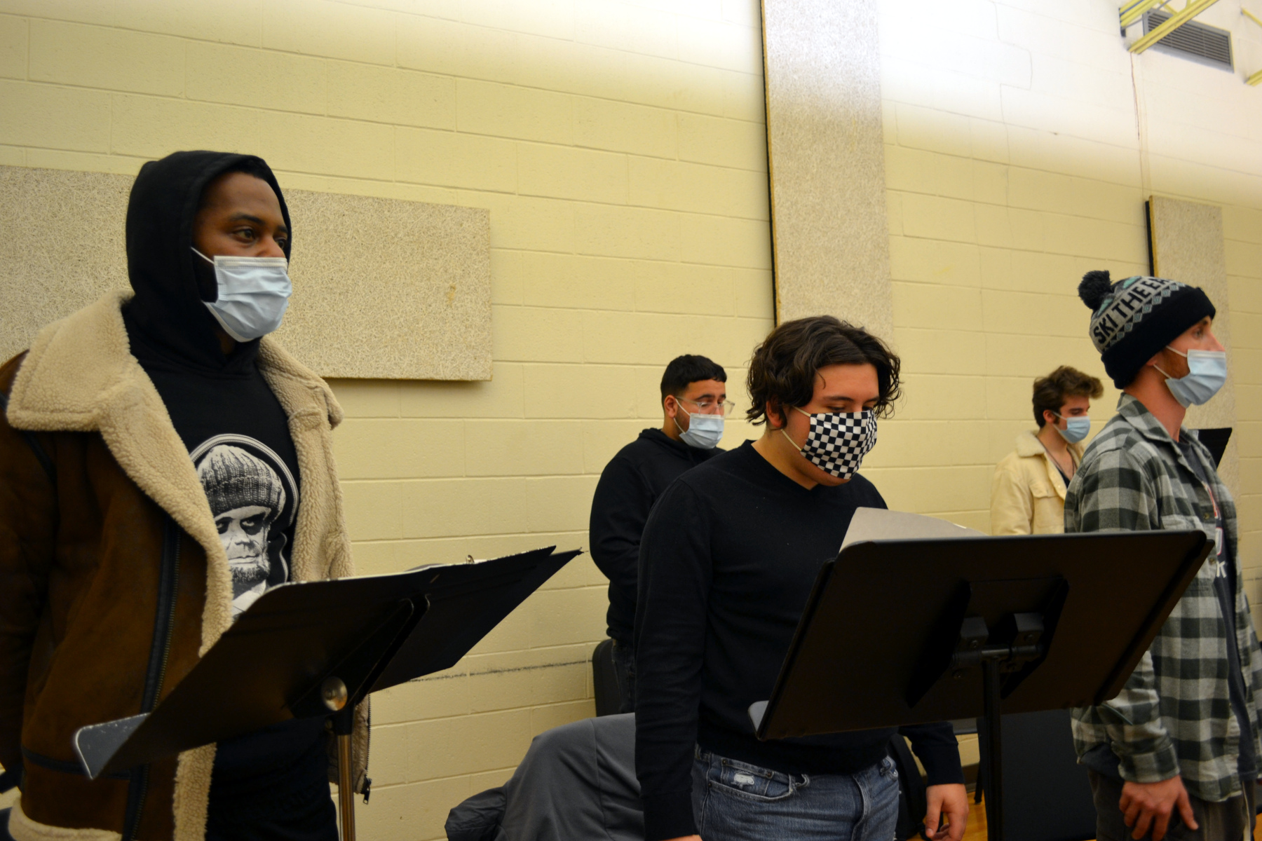 Vocalists rehearsing in music room